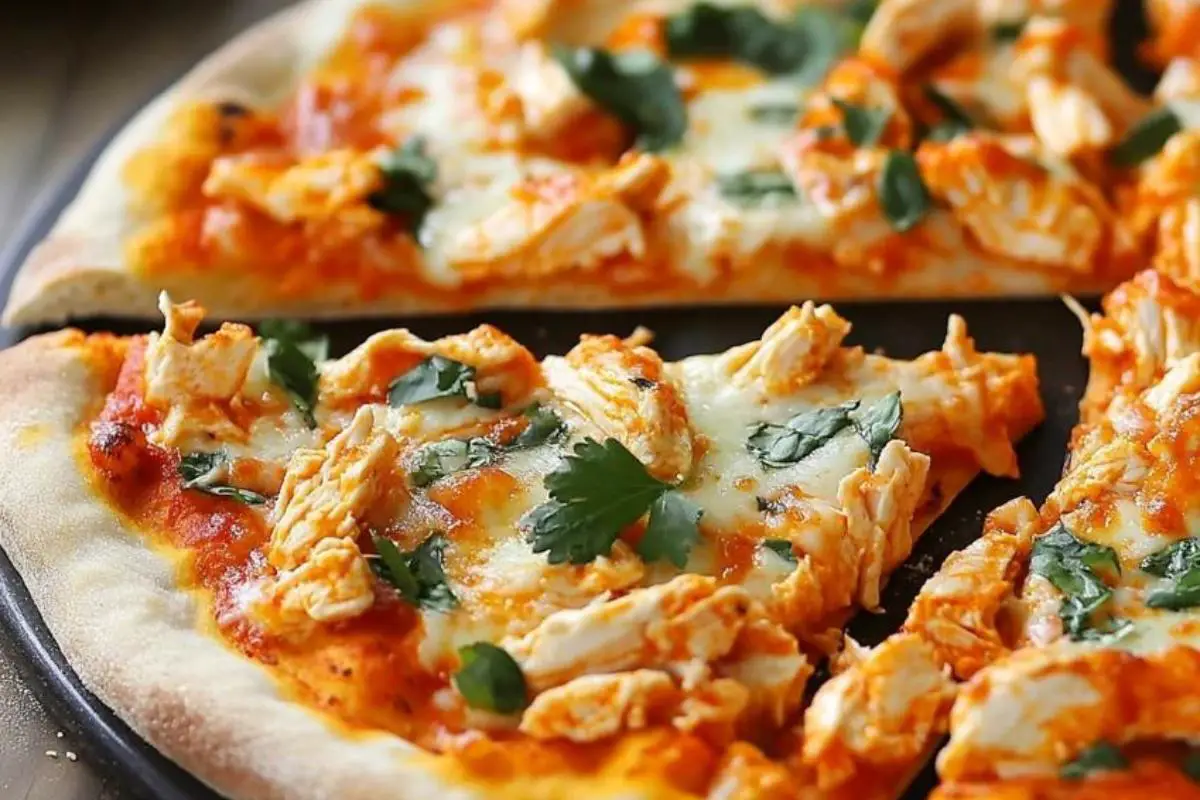 What is a buffalo chicken pizza made of? 1 Buffalo Chicken Pizza topped with mozzarella, blue cheese, buffalo sauce, and red onions on a crispy crust.