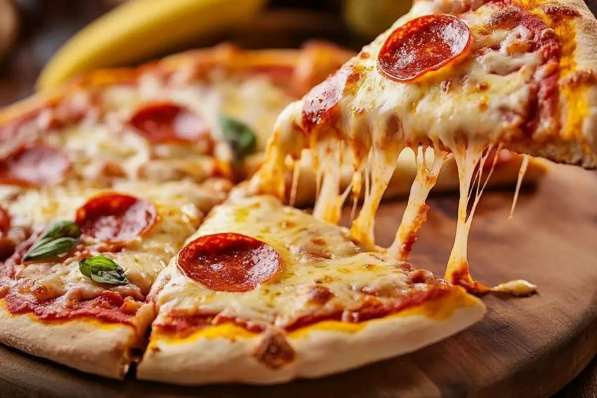 What makes buffalo pizza different? 1 buffalo pizza with thick crust and cup-and-char pepperoni beside Detroit-style pizza with crispy cheese edges and tangy sauce