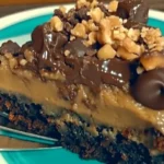German Chocolate Poke Cake 7 German Chocolate Poke Cake with coconut-pecan frosting and chocolate ganache on top