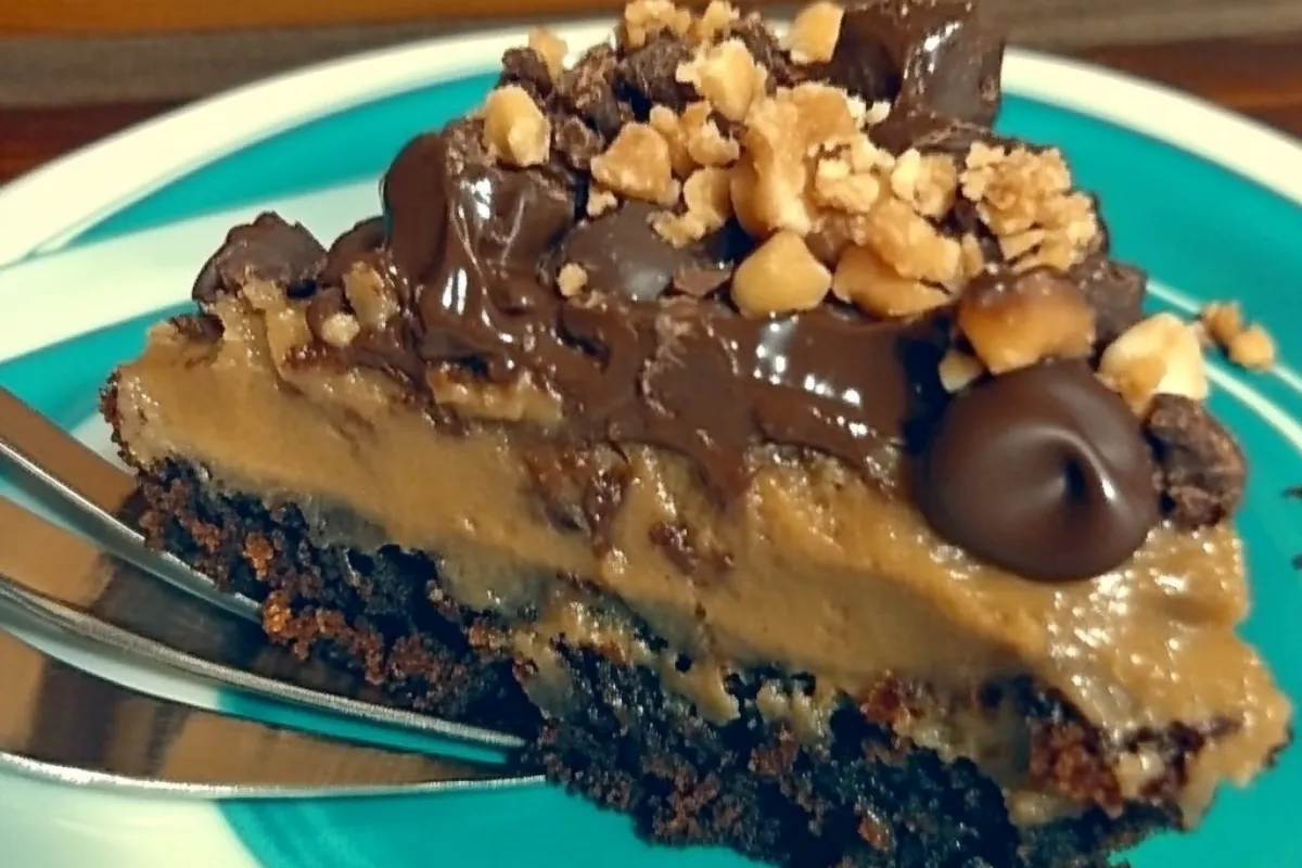 German Chocolate Poke Cake 4 German Chocolate Poke Cake with coconut-pecan frosting and chocolate ganache on top