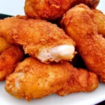 Popeye's CopyCat Fried Chicken 7 Crispy and golden-brown Popeye's CopyCat fried chicken with a spicy Cajun seasoning crust and juicy interior.
