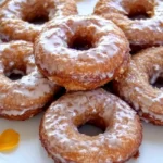 Old fashioned cake donuts 7 Old-fashioned cake donuts with glaze and cinnamon sugar on a plate