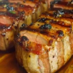 Bacon Brown Sugar Pork 7 Bacon brown sugar pork tenderloin wrapped in crispy bacon with caramelized brown sugar glaze.