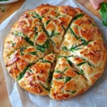Spinach Artichoke Dip Pull-Apart Christmas Bread 7 Spinach Artichoke Dip Pull-Apart Christmas Bread shaped like a Christmas tree, perfect for holiday gatherings and parties.