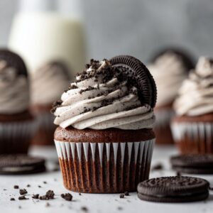 Cookies & Cream Cupcakes topped with creamy frosting and cookie crumbs