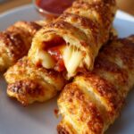Mummy Mozzarella Sticks: 3-Ingredient Halloween Snack Delight 9 Mummy Mozzarella Sticks: 3-Ingredient Halloween Appetizer