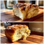 A close-up of a fluffy Cloud Bread Cinnamon Roll on a wooden board, showing the texture and glaze.