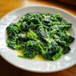 A plate of creamy, delicious Creamed Spinach, a classic side dish.