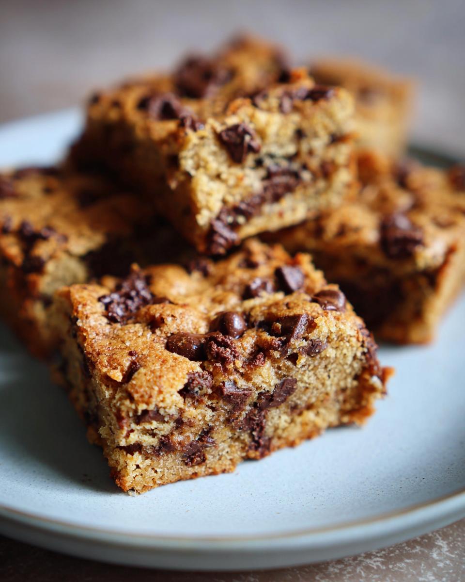 Close-up of chocolate chip bars, the star of the 'These Bars Are Better Than Brownies' recipe.