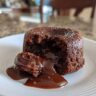 Close-up of a molten chocolate dessert, the chocolate dessert that breaks the internet, with flowing chocolate.