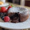 A decadent molten chocolate cake, the dessert I make when I want compliments, with fresh berries.