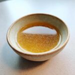 Amazing Fish Broth Cat Recipe: 1 Hero 11 Close-up of a bowl filled with homemade fish broth, perfect for a Fish Broth Cat Recipe.