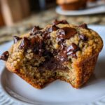 Close-up of a gooey cookie cup with chocolate chips, showcasing the deliciousness of the Ultimate Gooey Cookie Cup Hack.
