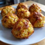 Amazing Grain-Free Fish Cat Treats in 10 Min 11 Close-up of several homemade Grain-Free Fish Cat Treats on a white plate.