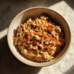 Amazing High-Protein Turkey Cat Food: 1 Hearty Meal 11 Bowl of homemade high-protein turkey cat food with visible shredded turkey and carrots.