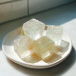 Amazing Homemade Cat Ice Treats: 12 Cool Licks 11 Close-up of Homemade Cat Ice Treats, square shaped, on a white plate, perfect for cooling your cat.