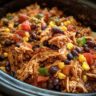 Close-up of a delicious Easy Crockpot Meal with chicken, black beans, corn, and tomatoes.