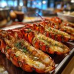 Close-up of perfectly grilled lobster tails with garlic butter, the primary keyword is Grilled Lobster Tails with Garlic Butter.