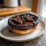 Close-up of a Grilled Portobello Mushroom Burger on toasted bread, ready to eat.