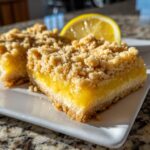 Amazing Lemon Crumb Bars: 1 Pan Bliss 11 Close-up of delicious Lemon Crumb Bars, a sweet treat with a crumb topping and lemon filling.
