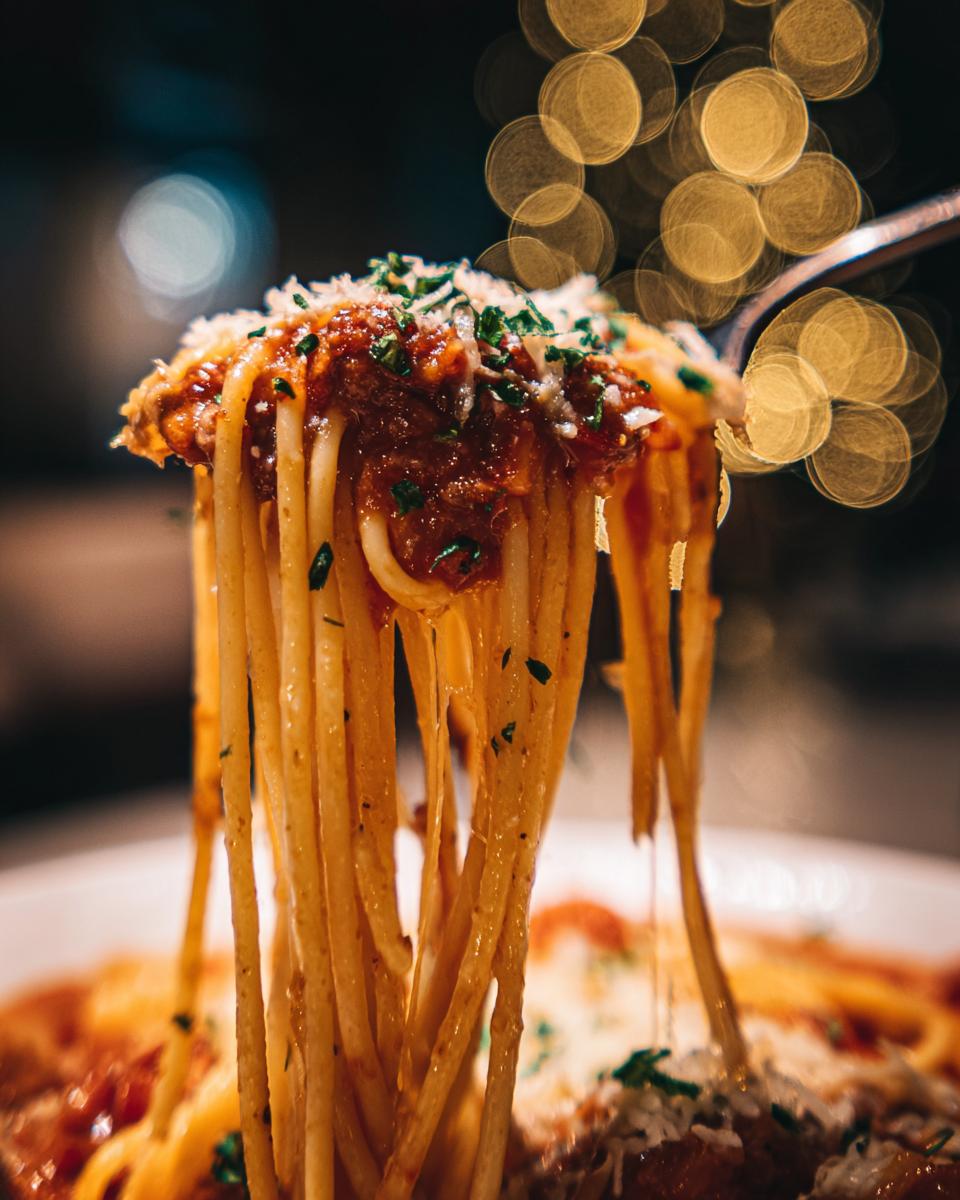 Amazing Pasta Salad That Keeps Well: 100 Calories 2 Close-up of pasta with sauce and cheese, potentially for a pasta salad that keeps well recipe.